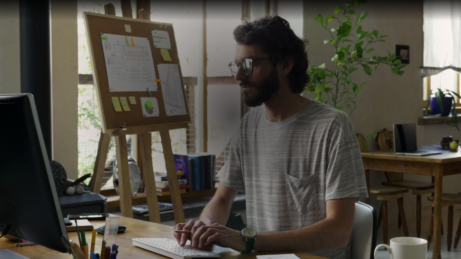 CC Homepage - Man at desk